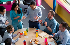 Team having a casual discussion around a table